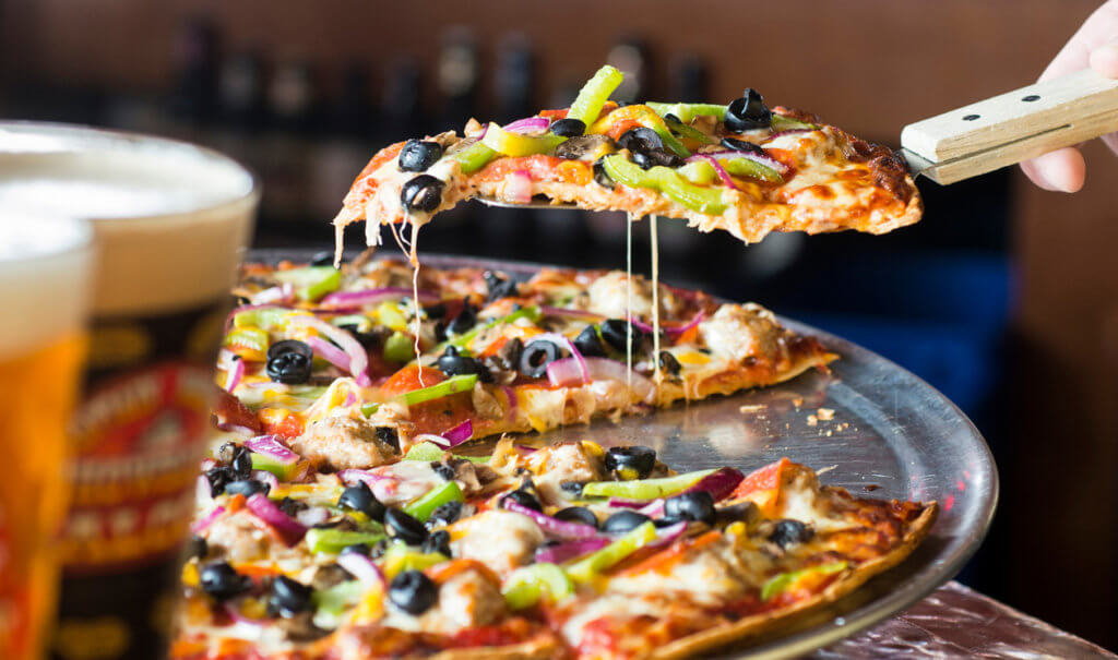 Pizza and beer at Showboat Saloon