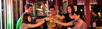 Young adults cheers drinks at Showboat Saloon