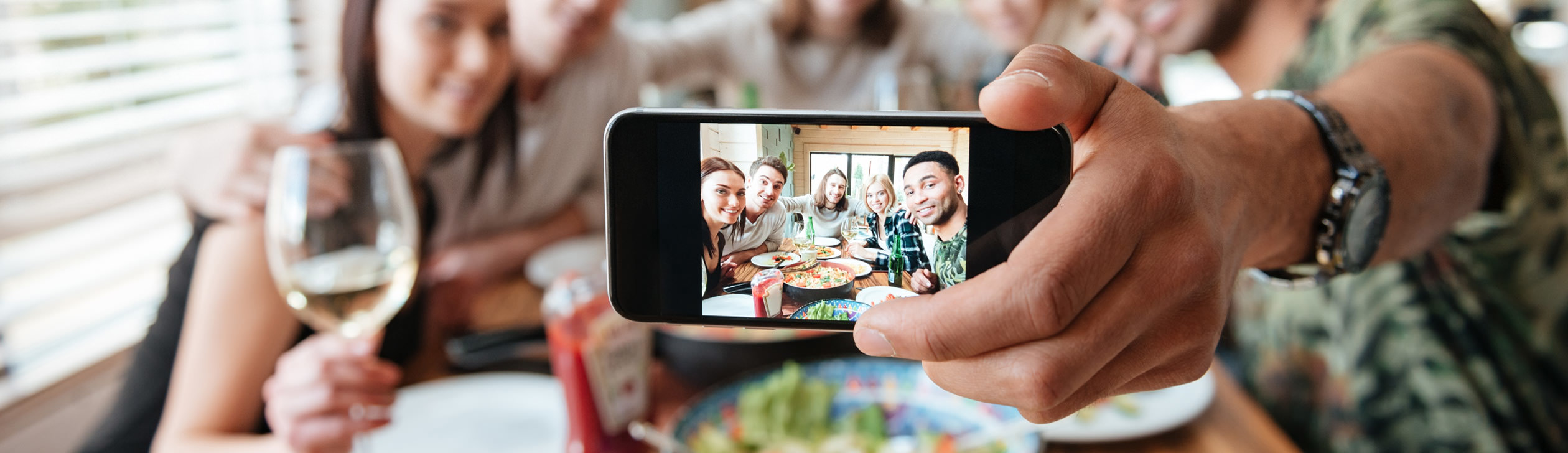 Group of young adults taking a selfie