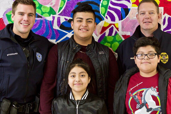 Police Officers (Kops) posing with Kids
